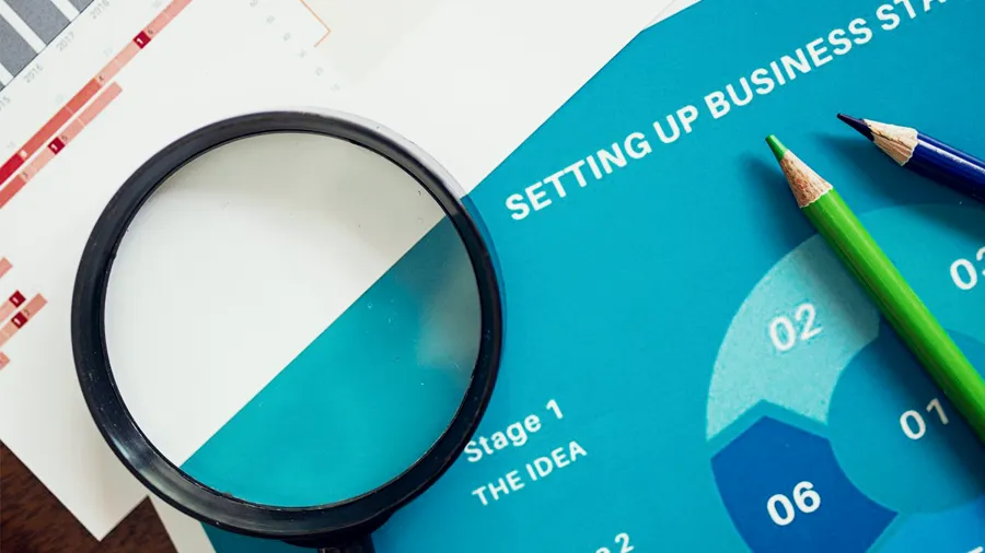 A printed plan showing the stages of building a business, standing for marketing services in Dubai